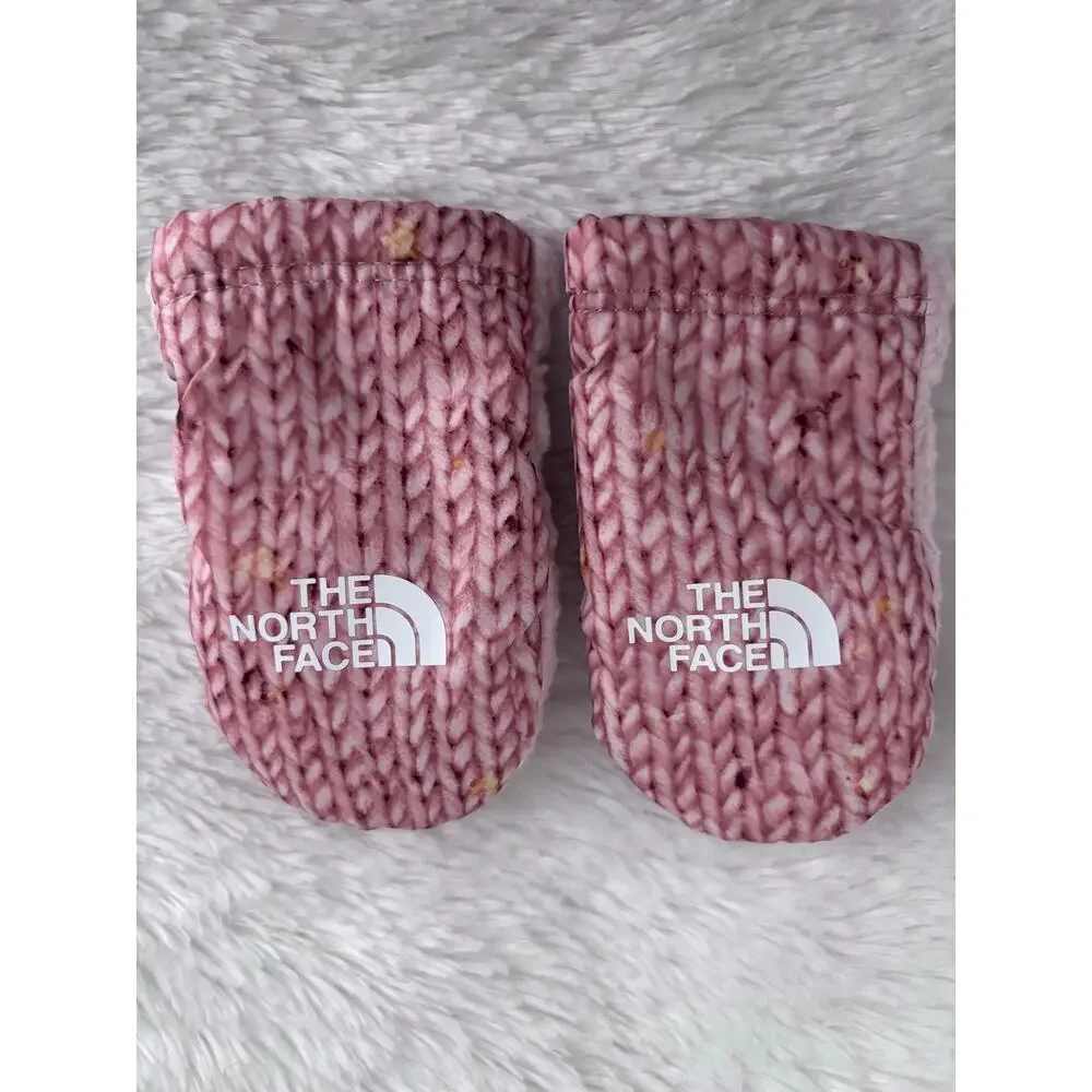The North Face Baby Bear Suave Oso Mitts in a pink knit pattern.Size XXS